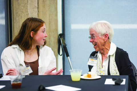 Nursing student Shannon Tripp (left) talks with Sue Kerr (69BSN, right), benefactor of the Sister Mary Stella Simpson DOC Scholarship at the Scholarship Tea.