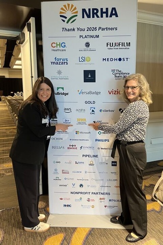 Nicole Weathers (IONRP) and Betty Mallen (University of Iowa College of Nursing) highlight the College of Nursing’s Gold Partner sponsorship—featuring the Iowa Online Nurse Residency Program—at the NRHA Annual Conference in San Diego, underscoring a shared commitment to advancing rural health nationwide.