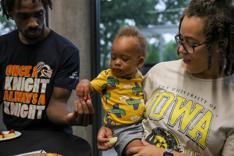 Alyssa Wessel (right) attends the College of Nursing pancake breakfast with her partner and son at the Nursing Building on Saturday, Sept. 17, 2022.