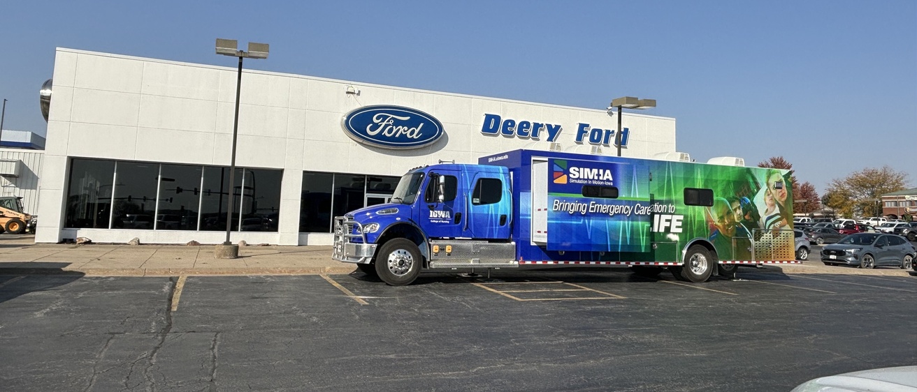 SIM IA truck outside deery ford