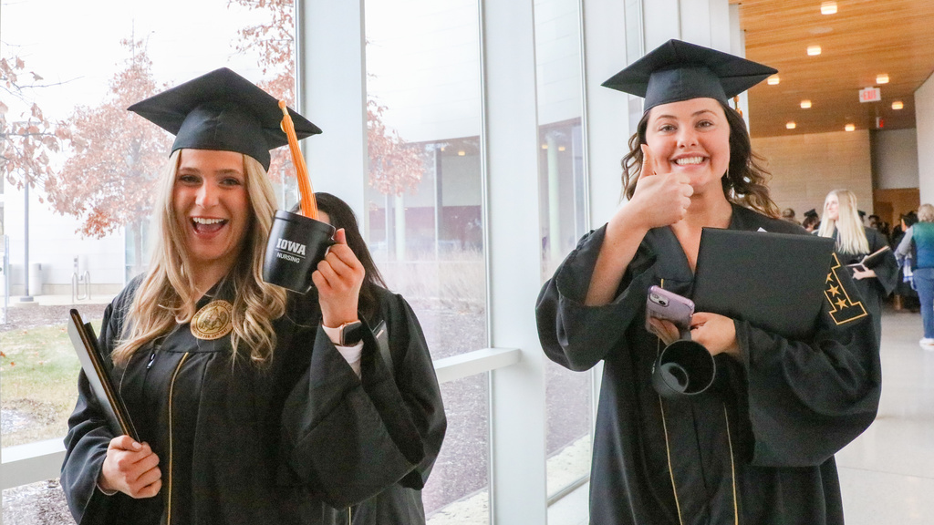 Two grads after commencement