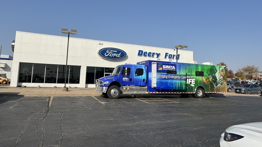 SIM IA truck outside deery ford